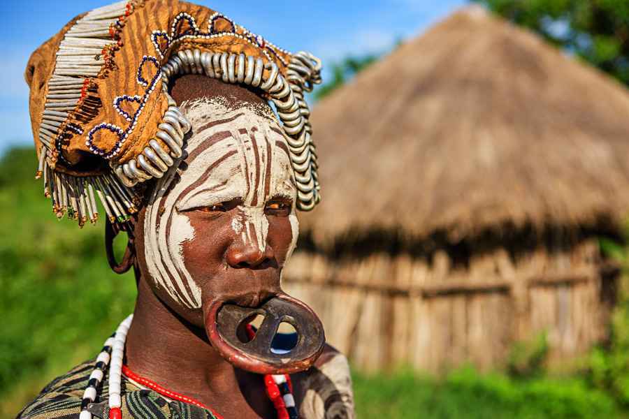 Portrait of woman from Mursi tribe, Ethiopia, Africa