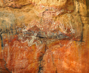 Aboriginal Rock Art of people dancing at Kakadu National Park, Northern Territory, Australia.
